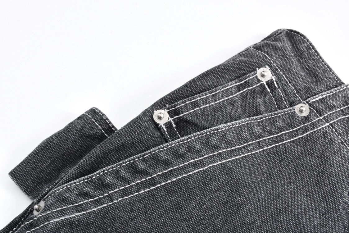 Multi-pocket patched leather jeans