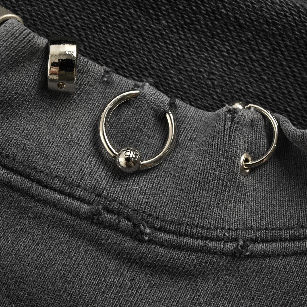 Round neck sweatshirt with rivet piercing at collar